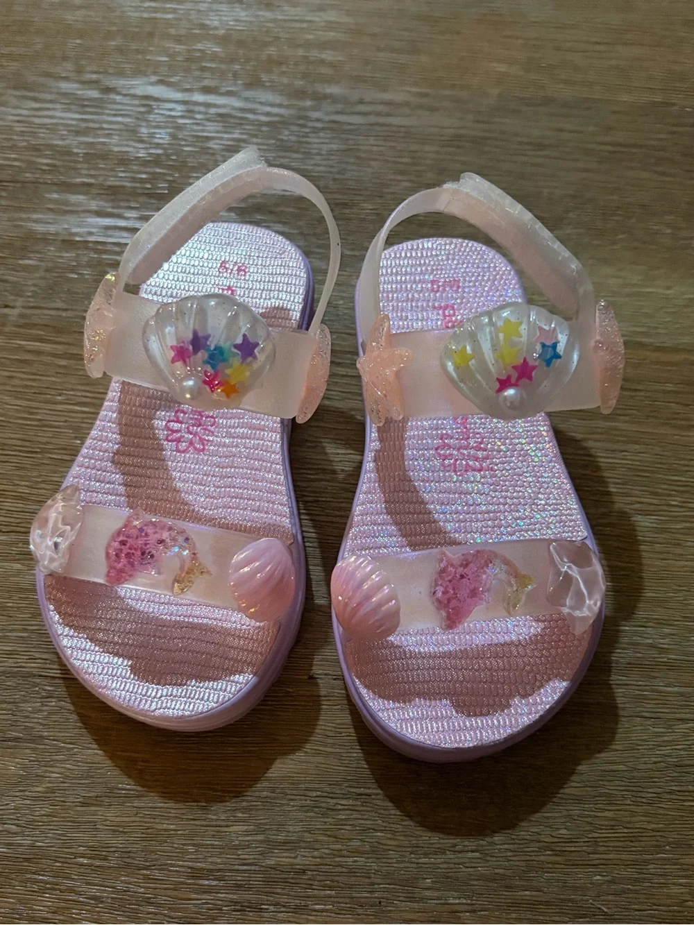 Girls Pink Jelly Sandals with Sea Charm Embellishments